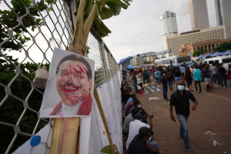 A vandalized statue of Prime Minister Mahinda Rajapaksa is seen at a protest site outside President Gotabaya Rajapaksa's office in Colombo, Sri Lanka, Saturday, April 23, 2022. (AP Photo/Eranga Jayawardena, File)