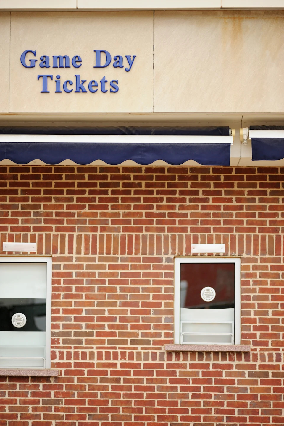 A ticket booth with a logo of 
