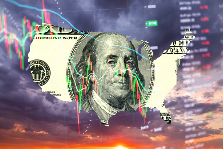 One hundred dollar bill shaped like a US map and economic data