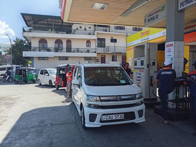 A series of petrol stations in Kandy, Sri Lanka [Ashkar Thasleem/ Al Jazeera]