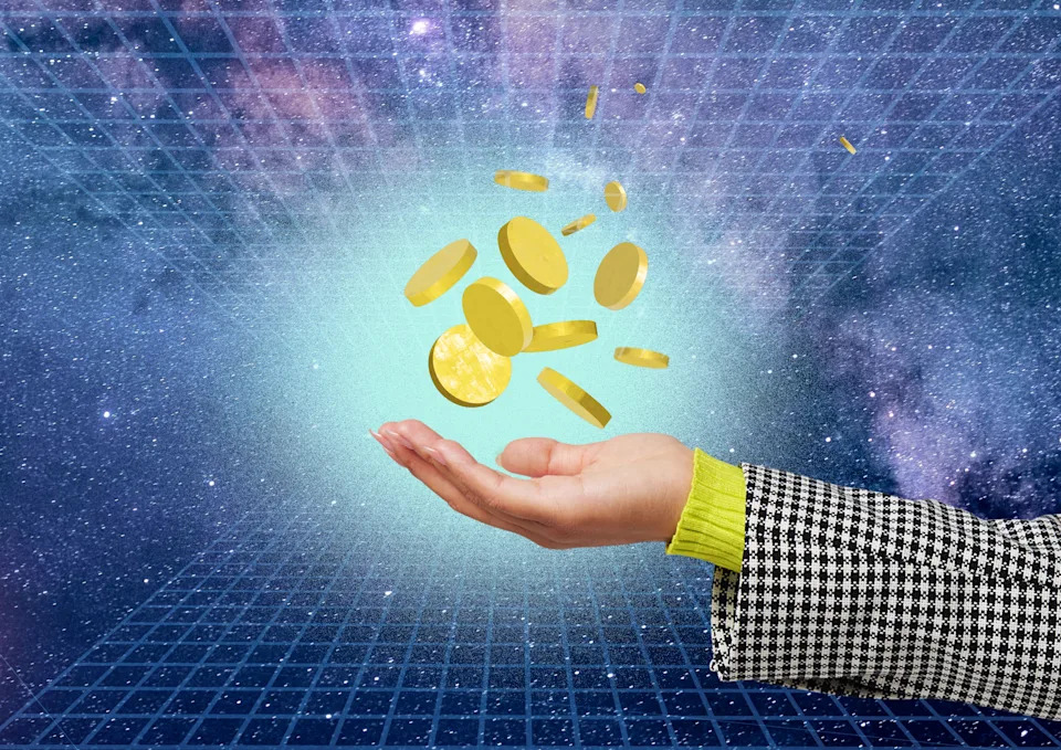 A hand holding glowing coins against a digital universe background, suggesting futuristic or online wealth